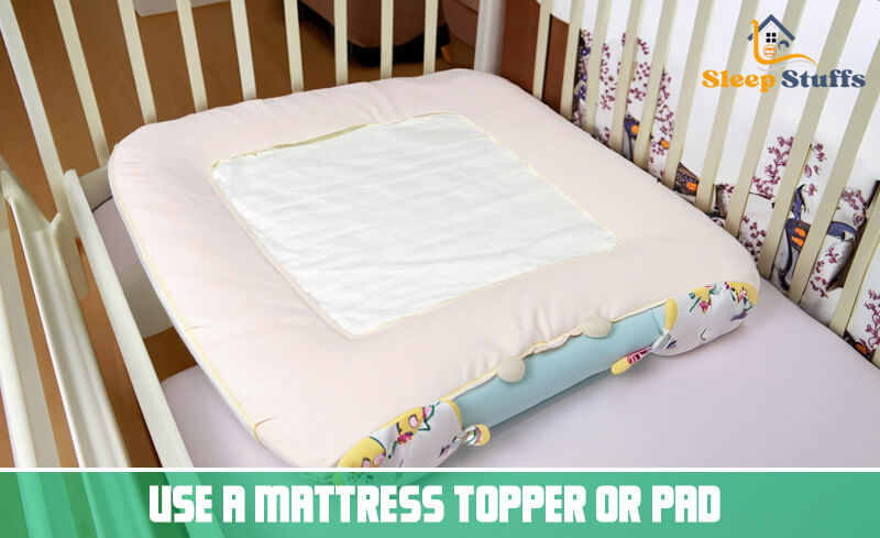 Use a mattress topper or pad